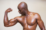 Shirtless muscular man flexing muscles